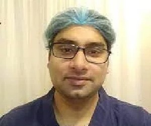 Dr. Alok T